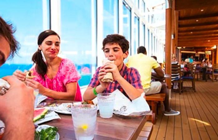 family dining at the taco bar onboard