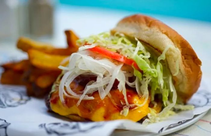 A burger plate with fries