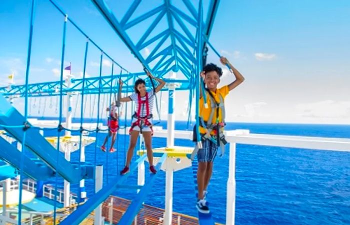 a family navigating the ropes course aboard a Dinogo ship