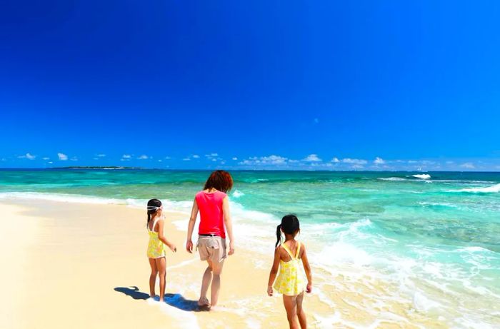 Family enjoying time at the beach in Okinawa