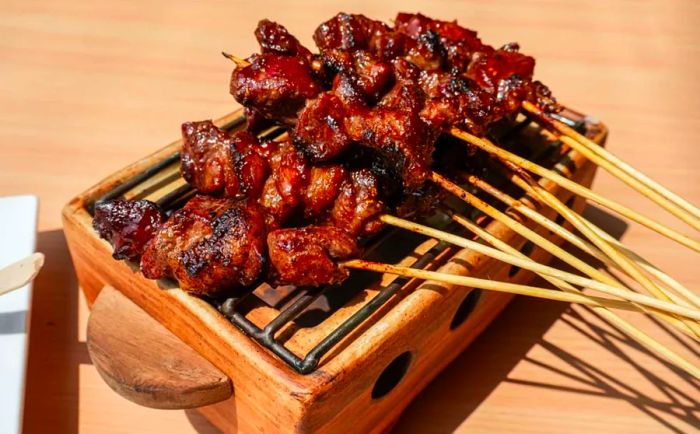 Homemade lamb or mutton satay marinated in spices and sweet soy sauce.