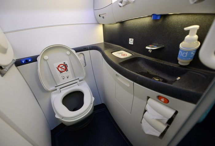 LOS ANGELES, CA - NOVEMBER 30: A touchless lavatory is showcased on the United Airlines Boeing 787 Dreamliner at Los Angeles International Airport on November 30, 2012. This new aircraft is set to start daily non-stop flights from Los Angeles International Airport to Japan's Narita International Airport in January, followed by routes to Shanghai beginning in March. The Boeing 787 Dreamliner has a capacity of 219 passengers, including 36 in United Business First, 70 in Economy Plus, and 113 in Economy Class. Made with carbon-fiber composite materials that constitute over 50% of its structure, the 787 is designed to be more fuel-efficient. (Photo by Kevork Djansezian/Getty Images)