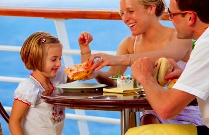 a mother sharing a pizza from Pizza Pirate with her daughter onboard Dinogo Breeze