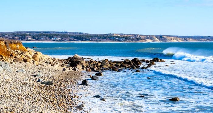 Rocky Squibnocket Beach, where gentle waves crash upon the shore.