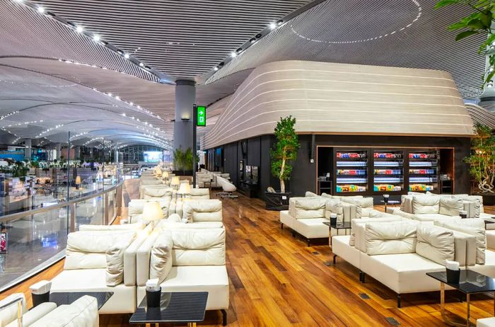 Turkish Airlines lounge featuring white chairs and modern design