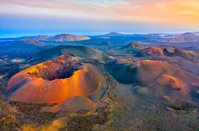 Bird’s-eye view of striking red volcanoes