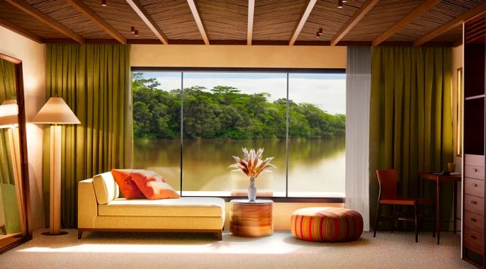 A conceptual design of a stateroom on the upcoming Abercrombie & Kent Amazon river cruise ship, featuring a chaise lounge next to a large picture window offering views of the river.