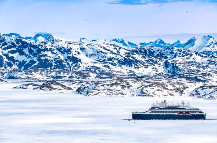 The Ponant cruise ship 'Le Commandant Charcot' navigating through the icy Arctic waters.