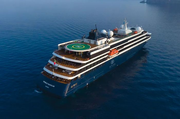 An aerial view showcasing the exterior of Atlas Ocean Voyages' expedition ship, the 'World Traveller'.