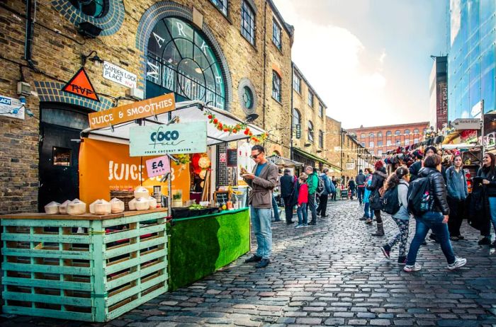 Outdoor market along the cobblestone streets of Camden Town, London