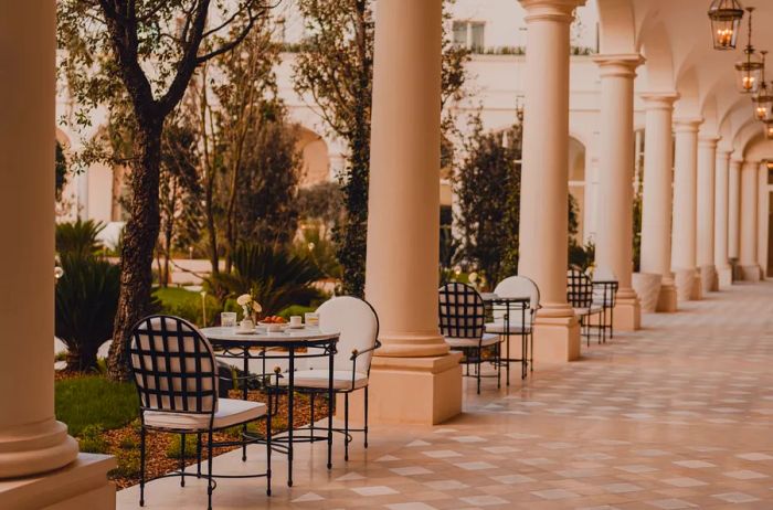 The interior gardens boast covered peristyle walkways.