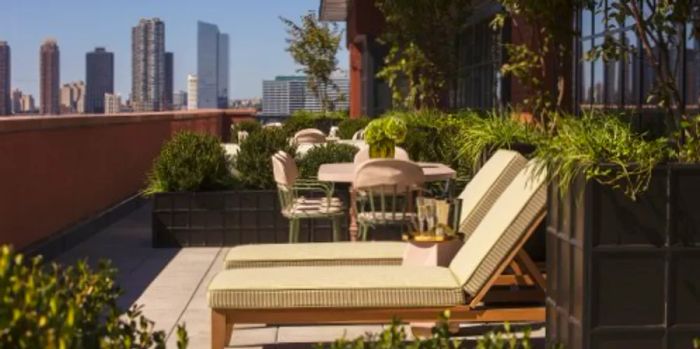 The terrace suites offer outdoor spaces that overlook the city skyline.