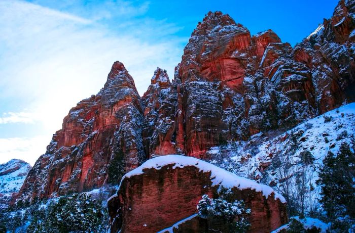 Majestic red rock formations at Zion National Park in Springdale, Utah, dusted with a blanket of snow.