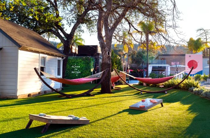 Dr. Wilkinson's Backyard Resort & Mineral Springs features relaxing activities like hammocks and corn hole.