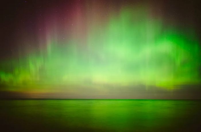 The northern lights cast a ghostly green glow from the deck of Fitzgerald's Hotel & Restaurant.