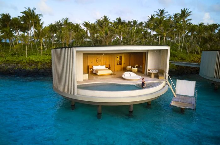 The overwater villa at the Ritz-Carlton Maldives, Fari Islands features a circular design inspired by the sun.