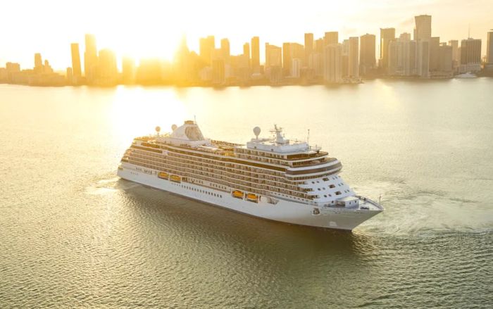 The 746-passenger 'Seven Seas Splendor' departing from Miami with the skyline as a backdrop