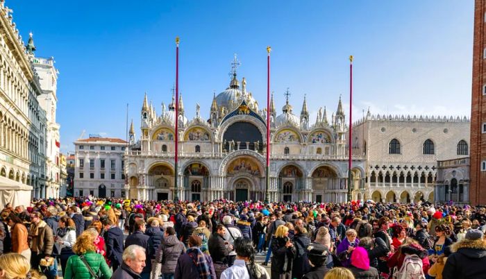 Crowds gather in St. Mark's Square in Venice