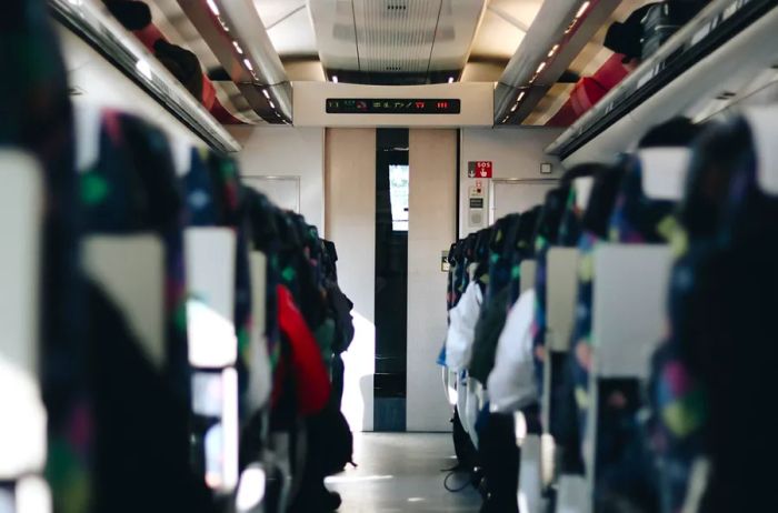 Inside a Japanese train filled with passengers