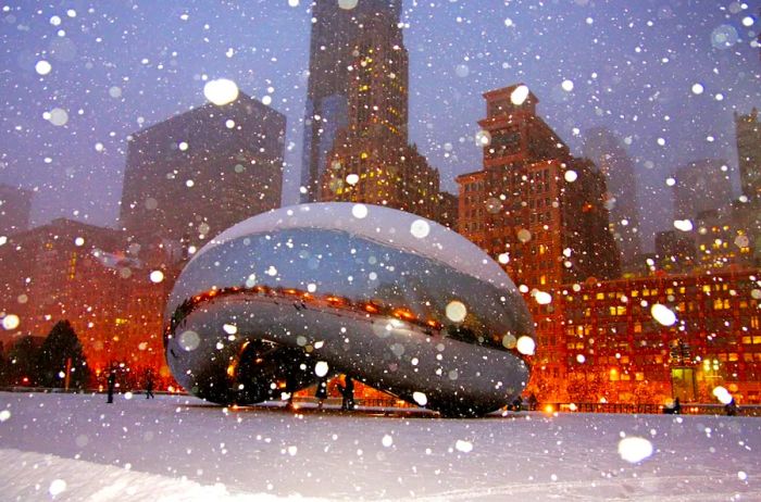 The Bean in Chicago's Millennium Park during a snowfall