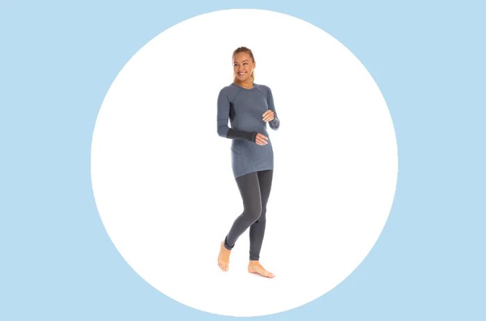 Woman wearing Artilect Goldhill base layers