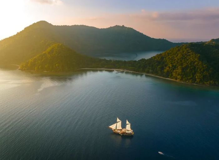 Celestia, a liveaboard vessel, cruises to Komodo National Park in Indonesia.