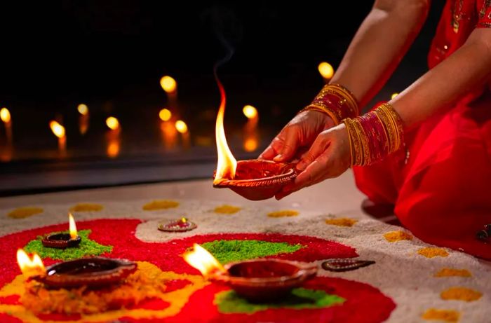 Traditional diya lamps glowing during Diwali celebrations