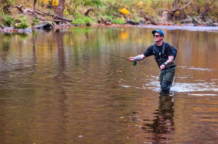 Asheville chef Graham House enjoying a day of fly fishing on Big Laurel Creek.