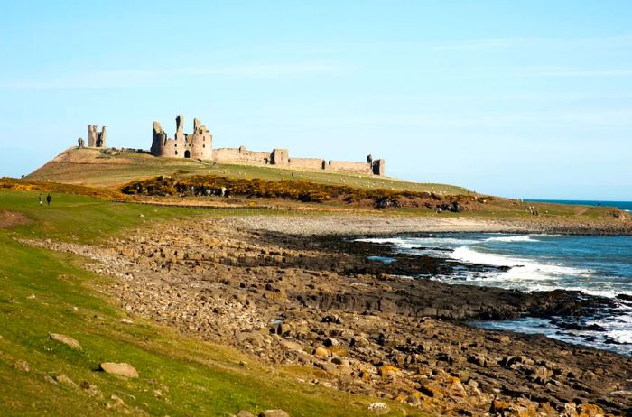 A castle by the beach on the Northumberland coast