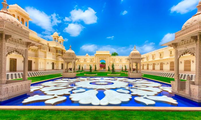 Oberoi Udaivilas in Rajasthan is adorned with meticulously maintained gardens and serene ponds.