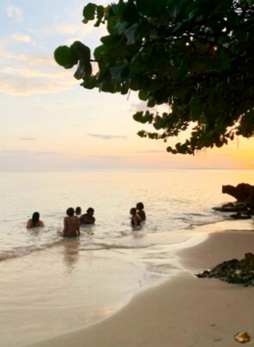 Enjoying the ocean waves at Bluefields Bay in Jamaica