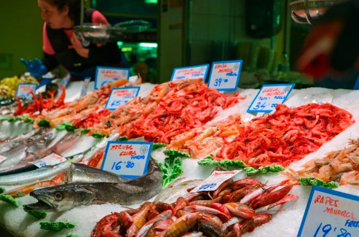 An artfully arranged selection of fresh fish and seafood awaits you at the Market Olivar in Palma de Mallorca.