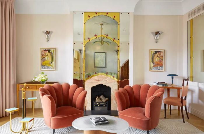 The Mayfair Suite at Claridge's boasts a cozy fireplace and elegantly scalloped art deco chairs.