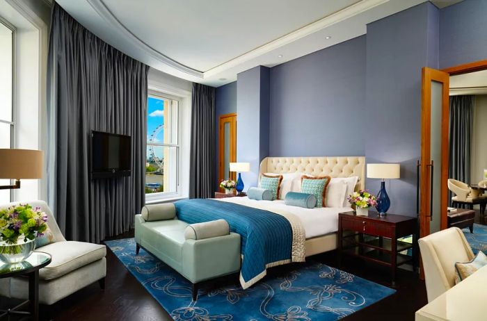 Corinthia London’s River Suite is designed in calming shades of blue and offers views of the River Thames.