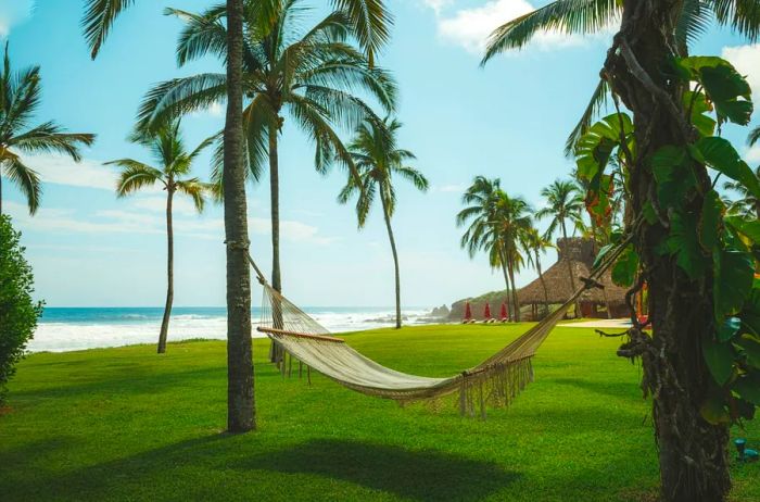 A serene hammock by the shore at Costalegre