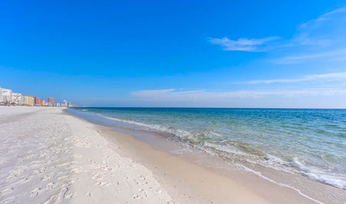 The gentle shores of Romar Beach in Orange Beach, Alabama