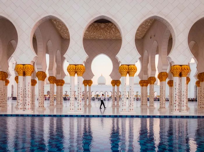 The white facade of the Sheikh Zayed Grand Mosque in Abu Dhabi