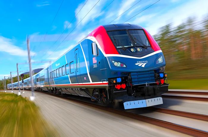 Image of a blue Amtrak Airo train on the tracks