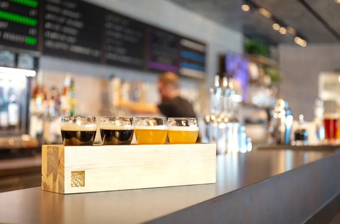 Guests at the United Club B-East lounge can enjoy a selection of beer flights from local Colorado breweries.