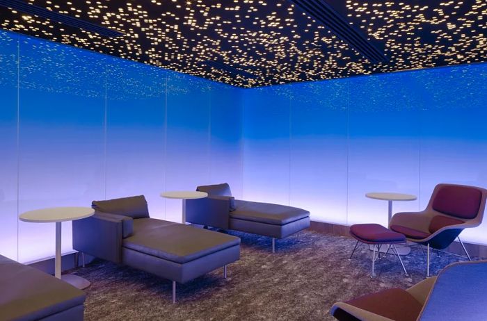 The softly lit Moonrise Tranquility Room in the Centurion Lounge at LAX features a black ceiling dotted with tiny lights.