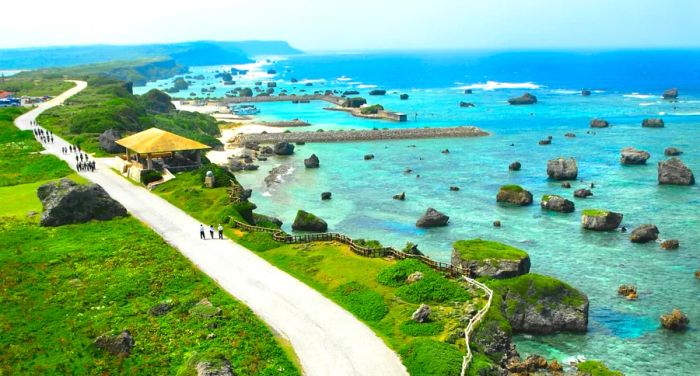 People stroll along the shores of Miyakojima Island in Okinawa Prefecture, Japan.