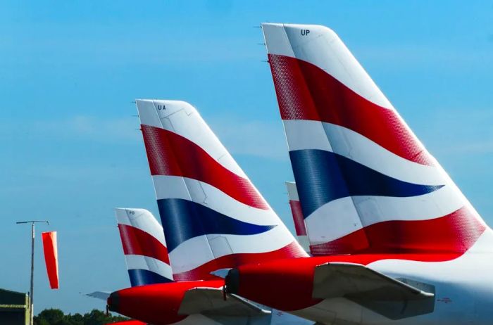 the tail of multiple British Airways aircraft