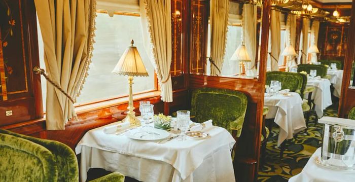 As guests travel between France and Italy, they are treated to gourmet meals served in elegantly designed dining cars.