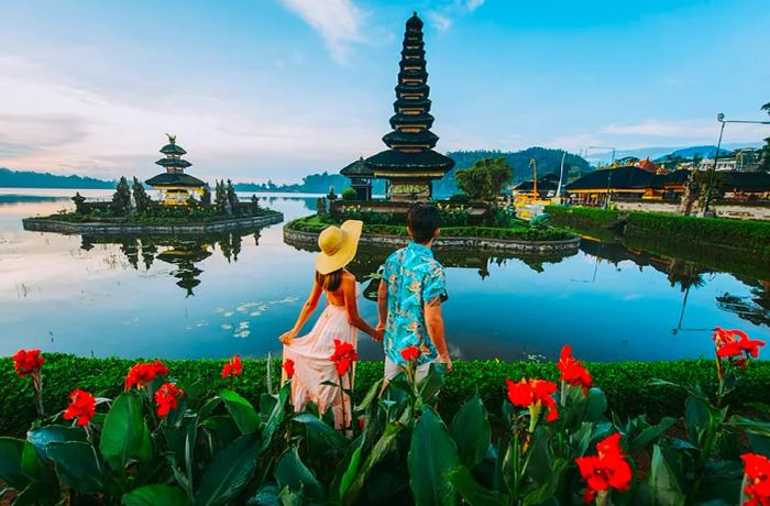 Couple at Ulun Datu Bratan Temple in Bali, Indonesia