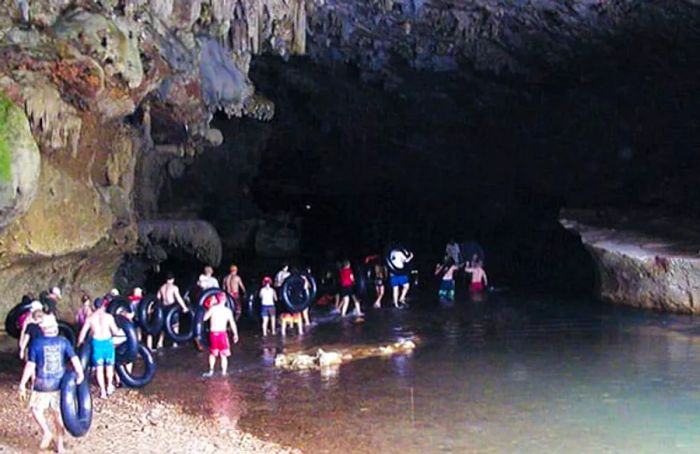 Experience cave tubing on a cruise to Belize