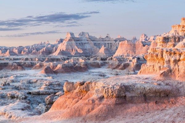 The early morning light casts a beautiful glow over the Badlands.