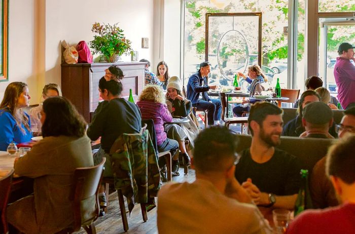 Patrons unwind at Lula Cafe, Chicago