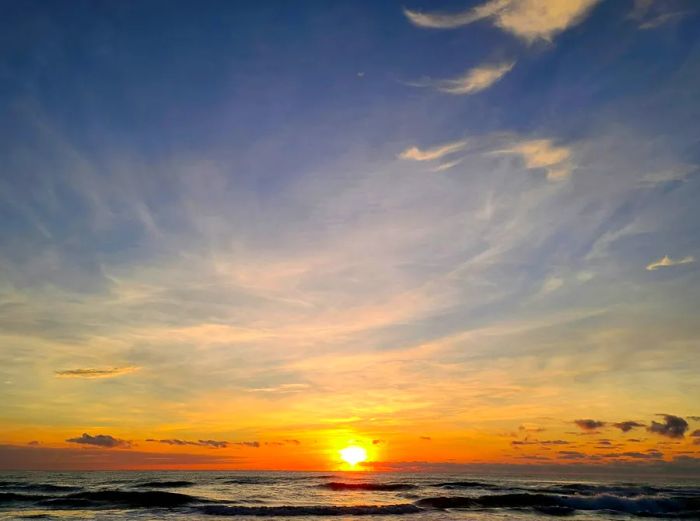 The sun ascending over the Gulf of Mexico as seen from South Padre Island in Corpus Christi, Texas