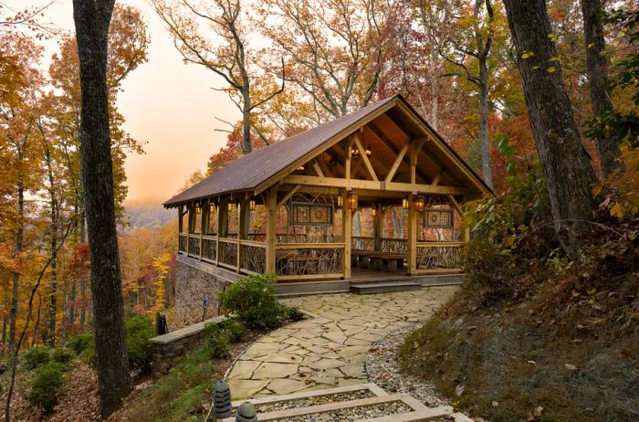 Wooden platform with a roof surrounded by forest