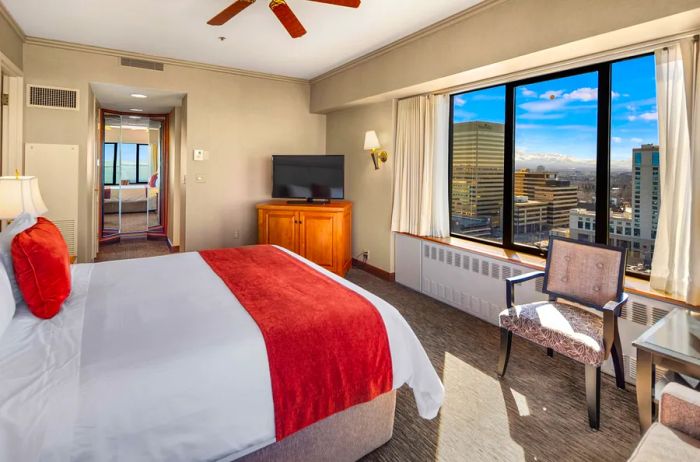 A guest room at Captain Cook Lodge showcasing views of Anchorage